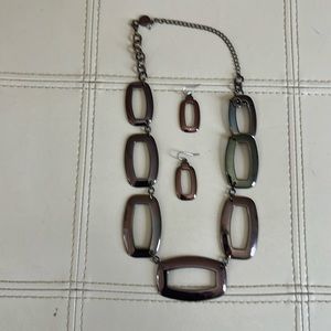 Metallic necklace and earrings set.